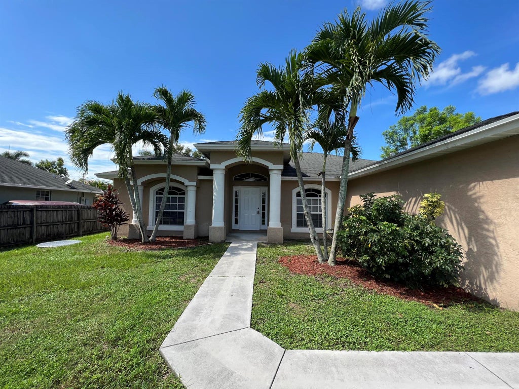 Photo of 1843 SW Altman Avenue, Port Saint Lucie, FL 34953 (MLS # R11015159)