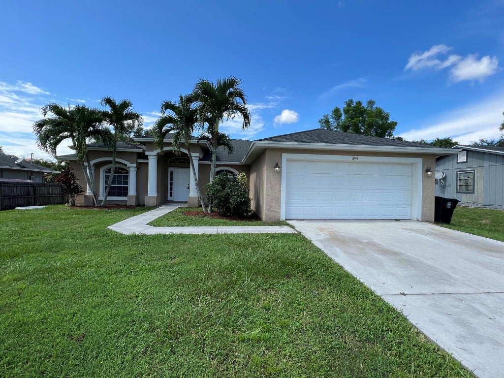Photo of 1843 SW Altman Avenue, Port Saint Lucie, FL 34953 (MLS # R11015159)