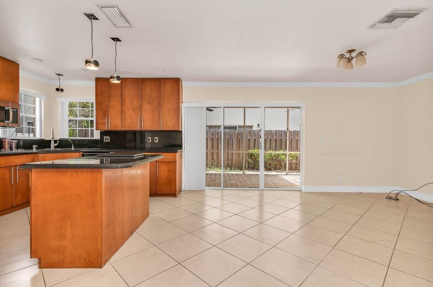 four bedrooms plus garage converted to office or any other use as needed and 3 bathrooms. Great community in a great location.no Hoa approval needed on a purchase. Old roof .