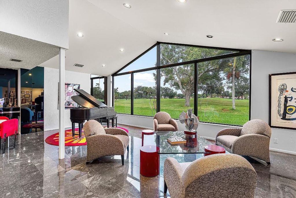 Photo of 14 Oaks Lane, Boynton Beach, FL 33436 (MLS # R11106339)