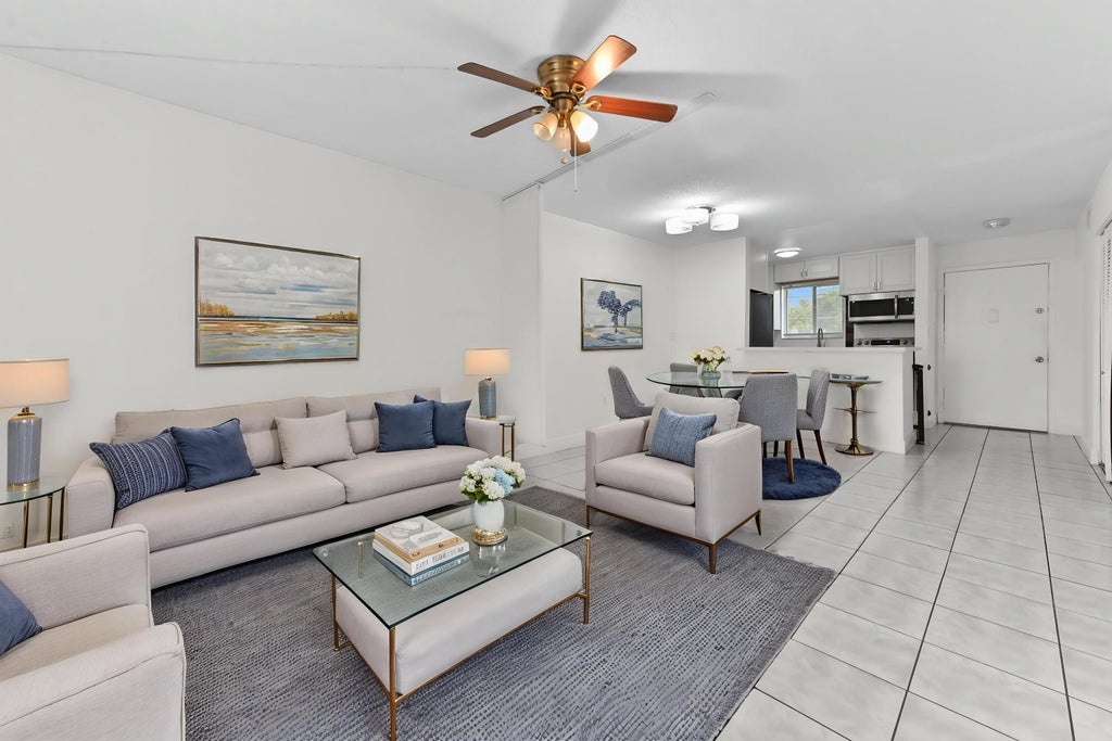 Photo of 6034 Forest Hill Boulevard #107, West Palm Beach, FL 33415 (MLS # B26079962)