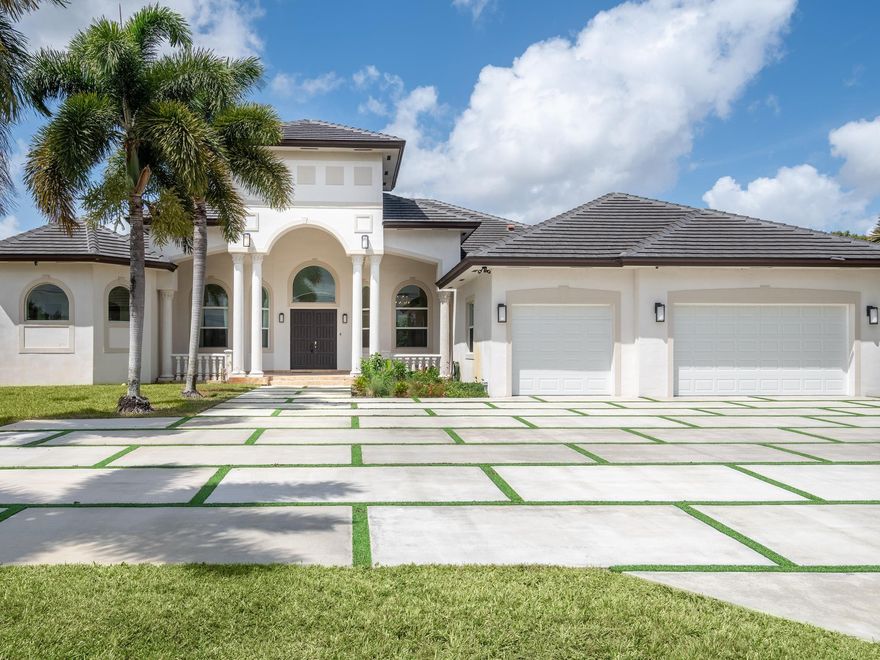 ***LUXURY CUSTOM-BUILT ESTATE*** NESTLED ON OVER 2 ACRES IN THE PRESTIGOUS TOWN OF SOUTHWEST RANCHES. DESIGNED FOR BOTH COMFORT AND ELEGANCE, THIS HOME FEATURES A NEWER ROOF AS WELL AS A THOUGHTFULLY DESIGNED TRIPLE SPLIT FLOOR PLAN, OFFERING PRIVACY AND SEAMLESS FLOW. ENTERTAIN WITH THE OPEN-CONCEPT KITCHEN WHICH SEAMLESSLY CONNECTS TO THE FAMILY ROOM AND BAR AREAS. EXQUSITE MARBLE & WOOD FLOORING THROUGHOUT. RELAX IN THE THEATRE, STEAM SHOWER OR RESORT STYLE POOL/SPA WITH TRAVERTINE DECKING. THIS HOME EMBODIES TIMELESS SOPHISTICATION ALL THE WHILE ENHANCED BY TRANSITIONAL ARCHITECTURE.