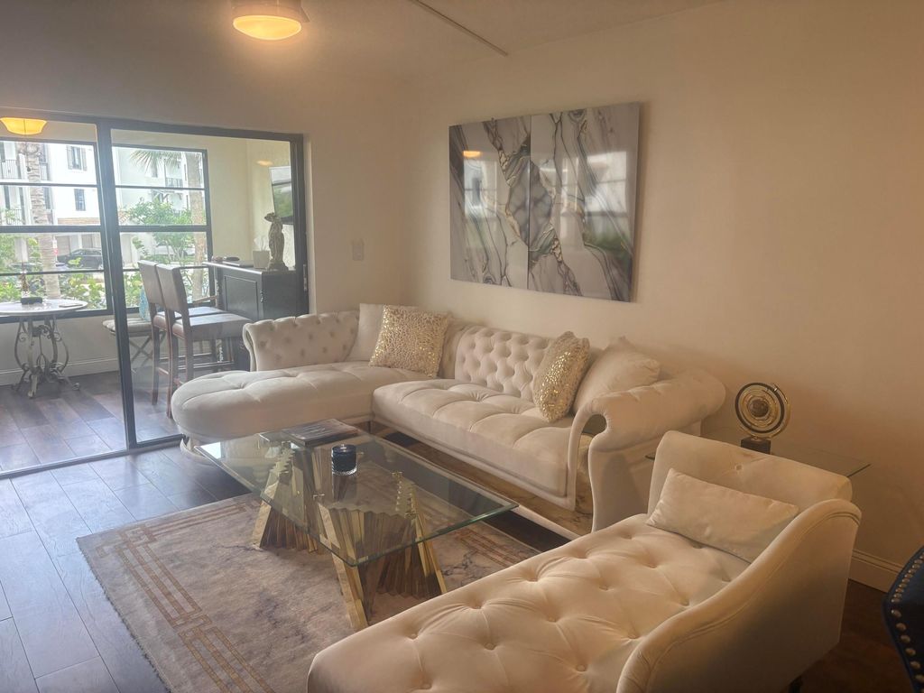 Photo of 9355 SW 8th Street #225, Boca Raton, FL 33428 (MLS # B26025311)