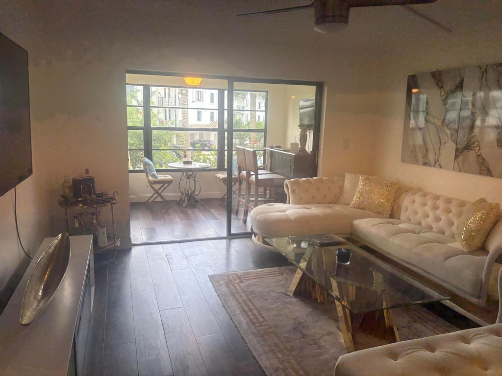 Photo of 9355 SW 8th Street #225, Boca Raton, FL 33428 (MLS # B26025311)