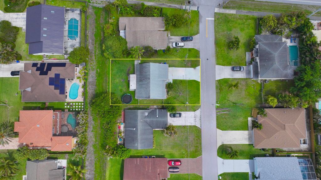 Photo of 6048 Garrett Street, Jupiter, FL 33458 (MLS # B26009080)