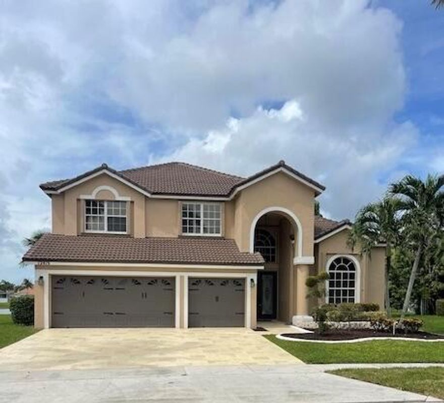 Annual rental in sought after Cascades Enclave at Boca Falls! Enjoy quiet and private lakeside living/w private pool in this 4 bdrm/3 full bth home, featuring bright white kitchen, granite counters and island, two spacious pantries. Soaring ceilings, Fml dining area w/ stylish bar. Spacious primary suite on main level.  2nd bdrm on main level with a cabana bath. Private 3rd & 4th bdrm and loft on the upper level with added laundry shoot to a full laundry room. Ceiling to floor windows w/ spectacular views.Tile/ wood floors. Relax by the pool side, take in the magnificent Florida sunsets overlooking the lake and experience the Boca Falls lifestyle. 3 car garage. TOP RATED SCHOOLSBackyard is spacious, private and fenced in for safety. Enjoy resort living. Club has tennis, play area,etc.