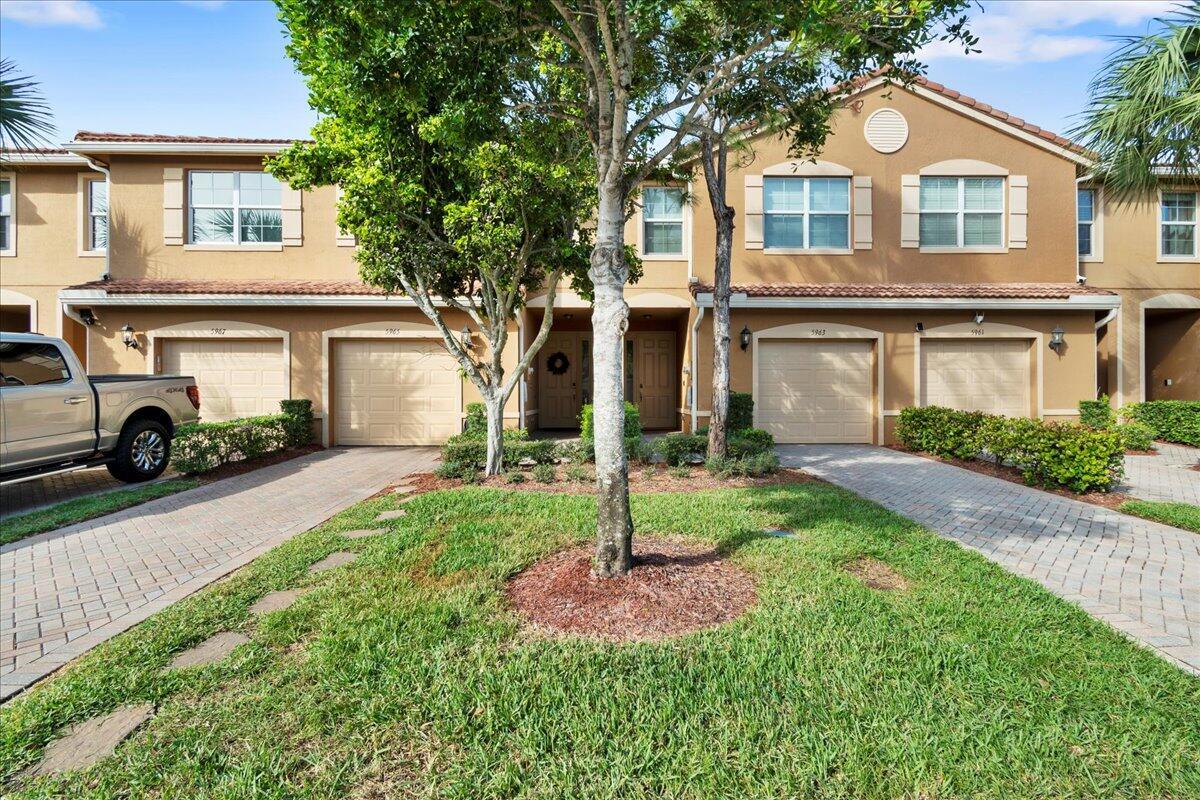 Move in ready! Nestled in a picturesque setting with breathtaking lake views, this exceptional 3-bedroom, 2.5-bath home offers both luxury and comfort. The home features impact-resistant windows and doors (including sliders), providing peace of mind and energy efficiency, while custom plantation shutters add an elegant touch throughout. Equipped with smart home NEW appliances, 3 yr old AC, freshly painted and this home seamlessly combines modern technology with stylish living. The spacious second floor boasts durable, waterproof laminate flooring, perfect for easy maintenance and lasting beauty. The master suite is a true retreat, complete with two expansive walk-in closets and a spa-like ensuite bathroom featuring dual vanities, a separate soaking tub, and a walk-in shower.