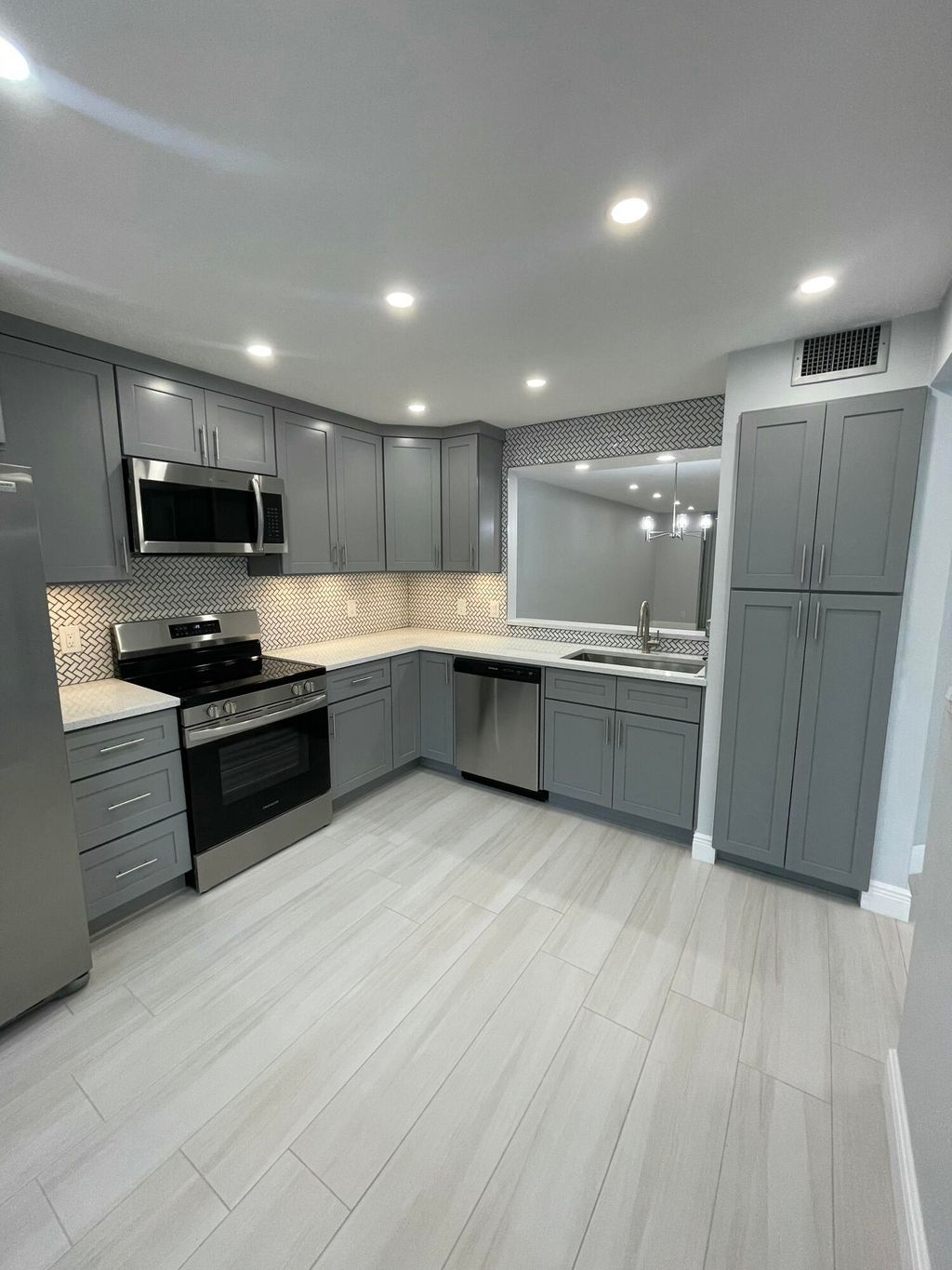 Photo of 6698 10th Avenue N, Greenacres, FL 33467 (MLS # B26011169)