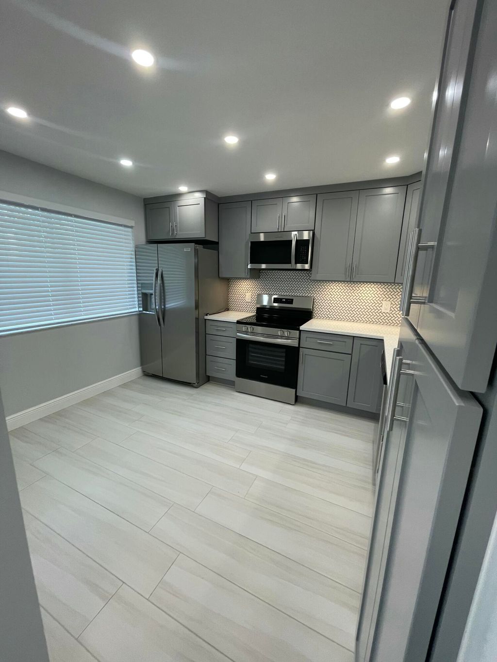 Photo of 6698 10th Avenue N, Greenacres, FL 33467 (MLS # B26011169)