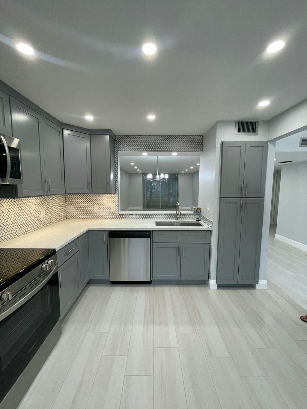 Photo of 6698 10th Avenue N, Greenacres, FL 33467 (MLS # B26011169)