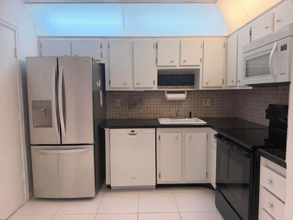 Photo of 4751 NW 21ST Street #303, Lauderhill, FL 33313 (MLS # B26053067)