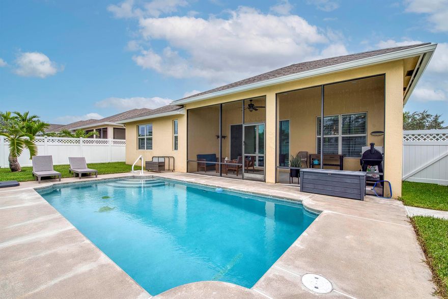 This stunning Key West-style, POOL HOME is perfectly situated on a spacious, fenced-in lot in the highly desirable Bedford Park community. Boasting over 1,800 sq ft, this 3-bedroom, 2-bathroom home features an open concept, with granite countertops, solid wood cabinets, a brand new A/C system (2025) and updated water heater (2024), ensuring comfort and efficiency. Located just a short walk from fine dining, excellent shopping, top-tier medical facilities, scenic parks, and only minutes from I-95, this home offers both convenience and coastal charm. The HOA fee includes cable, high-speed internet, access to the community pool, as well as landscaping and lawn care, making maintenance effortless.