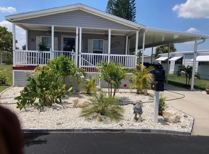 Photo of 88 Sandhill Boulevard, Fort Pierce, FL 34982 (MLS # B26076876)