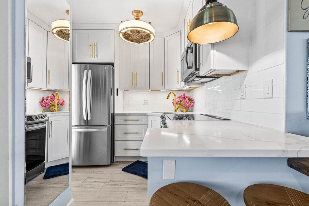 Photo of 629 SE 19th Avenue #702, Deerfield Beach, FL 33441 (MLS # R11091655)