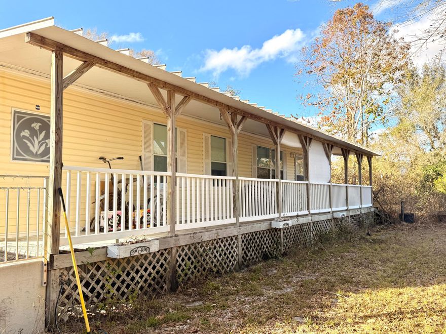 This spacious 3-bedroom, 2-bath mobile home offers the perfect blend of comfort, privacy, and room to roam. Situated on almost 9 fully fenced acres, the property is surrounded by mature trees and lots of foliage, creating a serene country setting with exceptional privacy. Enjoy relaxing mornings and evenings on the large front porch while taking in the natural surroundings. Two sheds provide ample storage or workspace. Furniture is negotiable, making this an easy move-in opportunity. Ideal for those seeking quiet country living with plenty of land to enjoy.