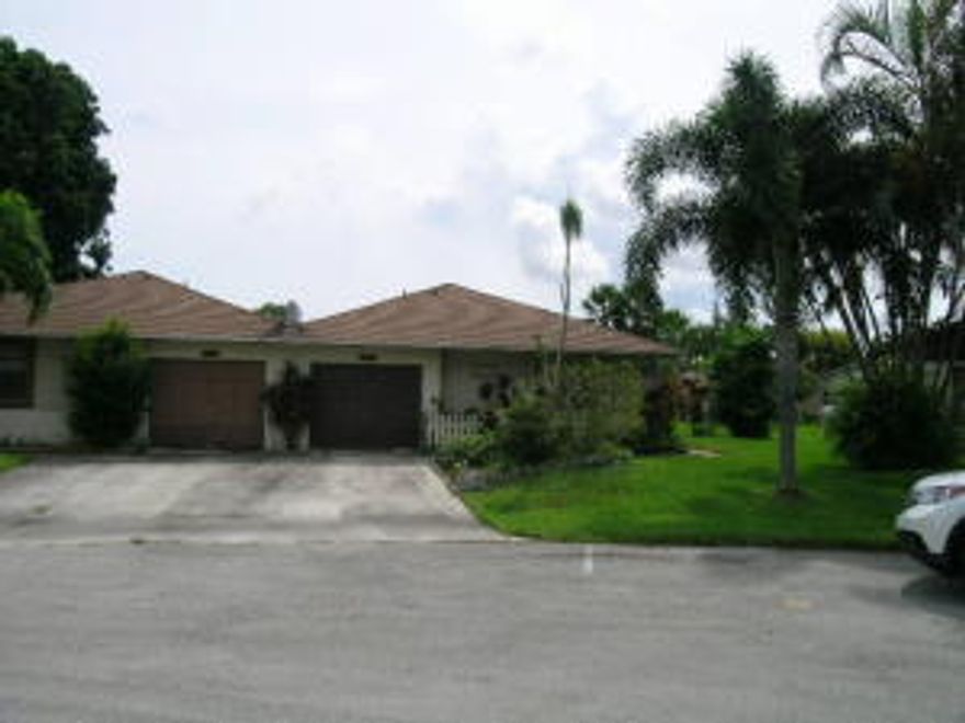 All measurements approximate.  Remodeled kitchen and baths.  Hurricane shutters throughout.  Nice villa close to everything.  Unit is in very good condition located on a cul de sac. Community pool.  Lake view from back yard.  Call listing agent, Pablo, for more details and showing.