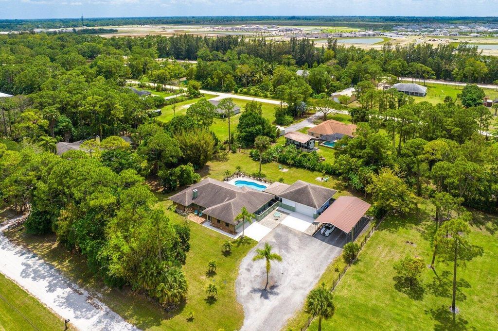 Photo of 14884 61st Court N, The Acreage, FL 33470 (MLS # R10979293)