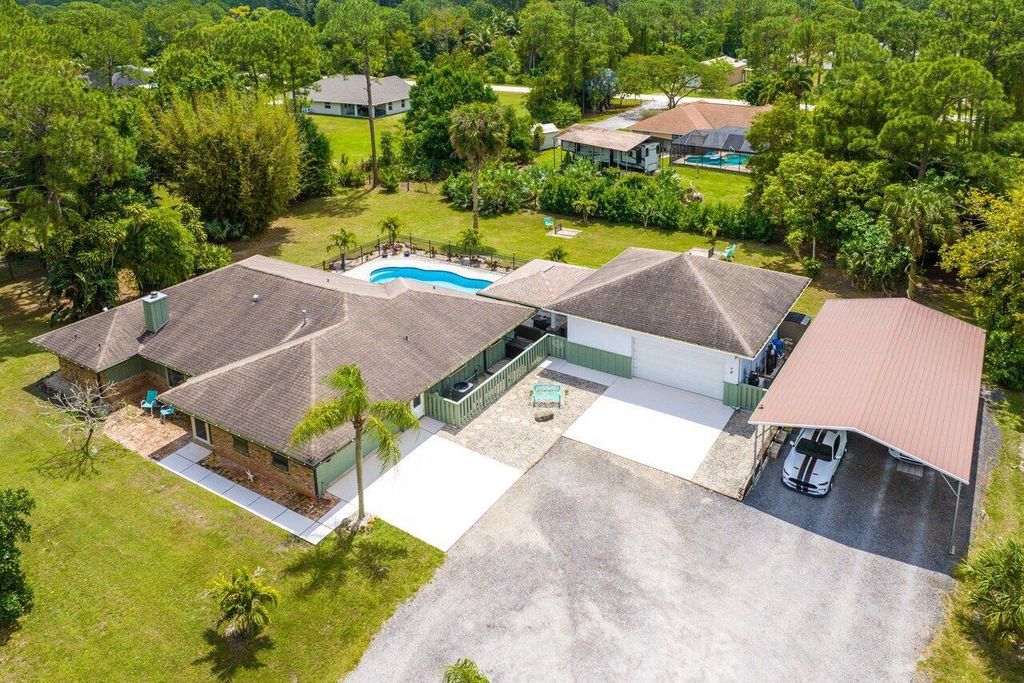 Photo of 14884 61st Court N, The Acreage, FL 33470 (MLS # R10979293)