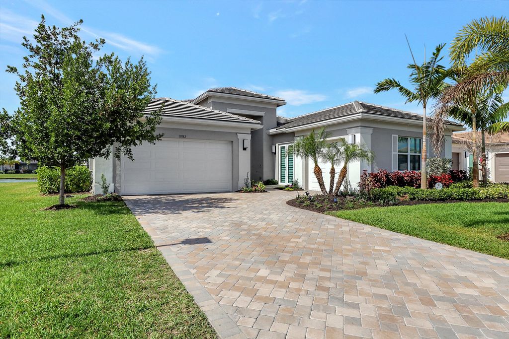 Photo of 11882 SW Marigold Lakes Drive, Port Saint Lucie, FL 34987 (MLS # R10780685)