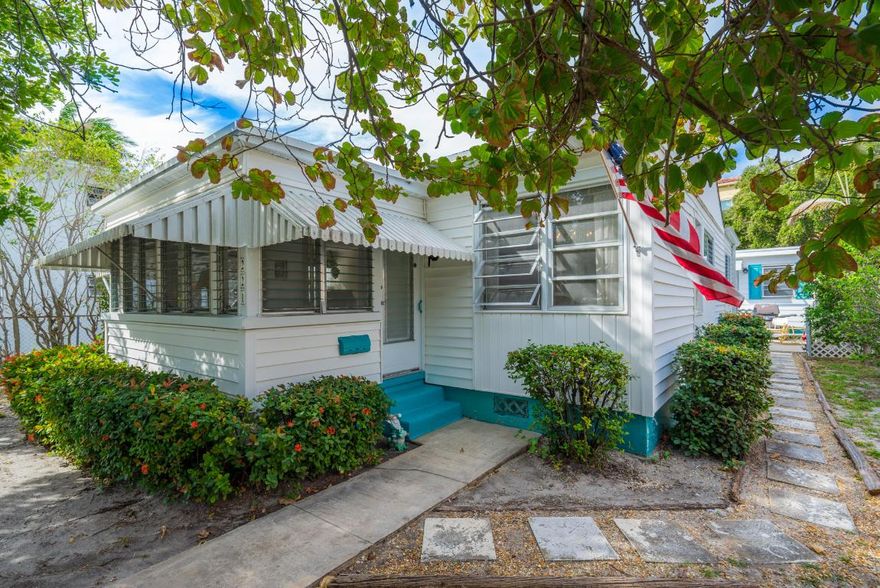 For the Investor, this is a no-brainer: LOCATION is Everything! 2 Turnkey homes, NO RENTAL RESTRICTIONS, on a full lot in a quiet neighborhood, blocks from Bryant Park,the Intracoastal (at it's widest in S Florida),just a walk over the bridge to the beach.The main house, 2/1 could be Rented for $1800, Cottage for $1000, as Annual Rentals; or double that for Seasonal Rentals. Lake Worth is a destination for Tourists, as one of the last easy to walk, close to the water towns, with many City Amenities, including a Municipal Golf Course, City-owned beach with Event Venue on the 2nd floor of the Casino Building.