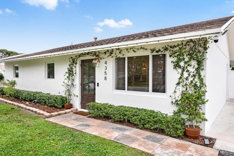 Photo of 4358 BIRDWOOD Street, Palm Beach Gardens, FL 33410 (MLS # B26077470)