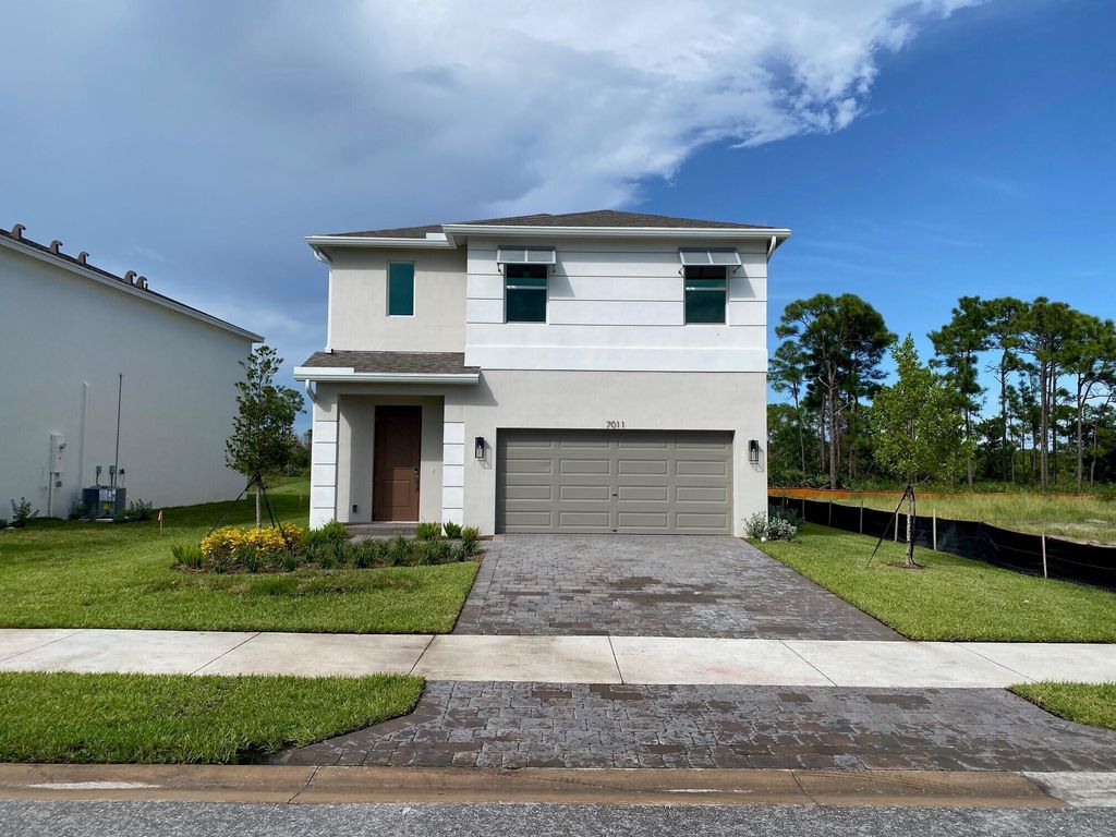 Photo of 7011 SE Park Trace Drive, Stuart, FL 34997 (MLS # R11102657)