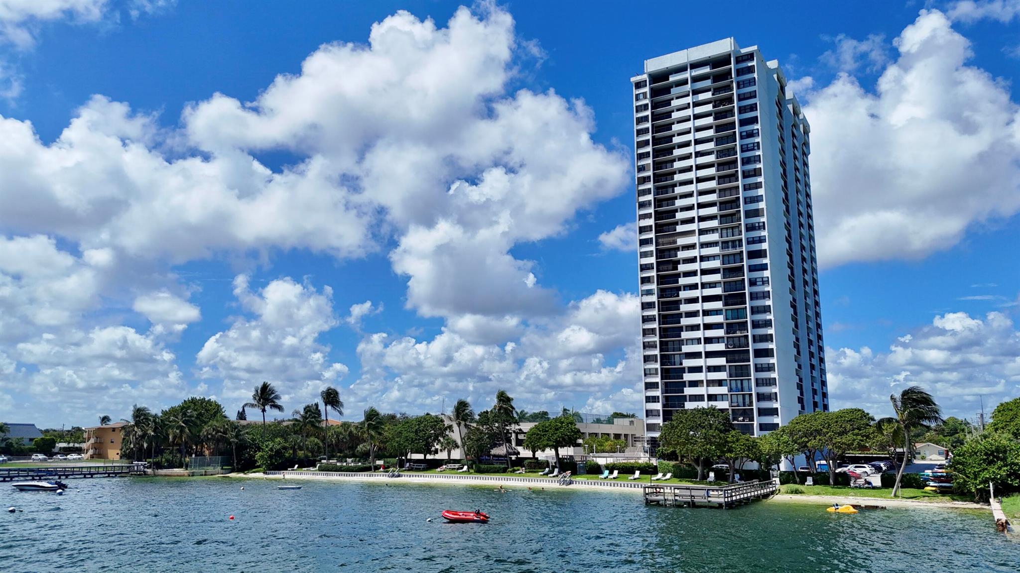 Exceptional Value! Spacious 2 bedroom, 2 bath split condo with breathtaking intracoastal water views. The modern Kitchen features updated wood cabinets & granite tops. A Bright Living area is adorned with brand new large porcelain tile A washer/dryer is conveniently located in the unit. The condo is offered furnished. Enjoy luxury amenities including 24 hour manned gate & lobby, private beach, fitness center, salt water pool, gaming room, & dock for fishing. Cable, internet, and water are included in rent. Conveniently located to downtown & Clematis shops, restaurants, and WPB international Airport. Don't miss this incredible opportunity!
