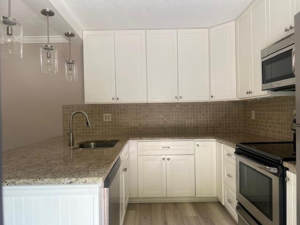 Photo of 2702 27th Court, Jupiter, FL 33477 (MLS # R11096550)