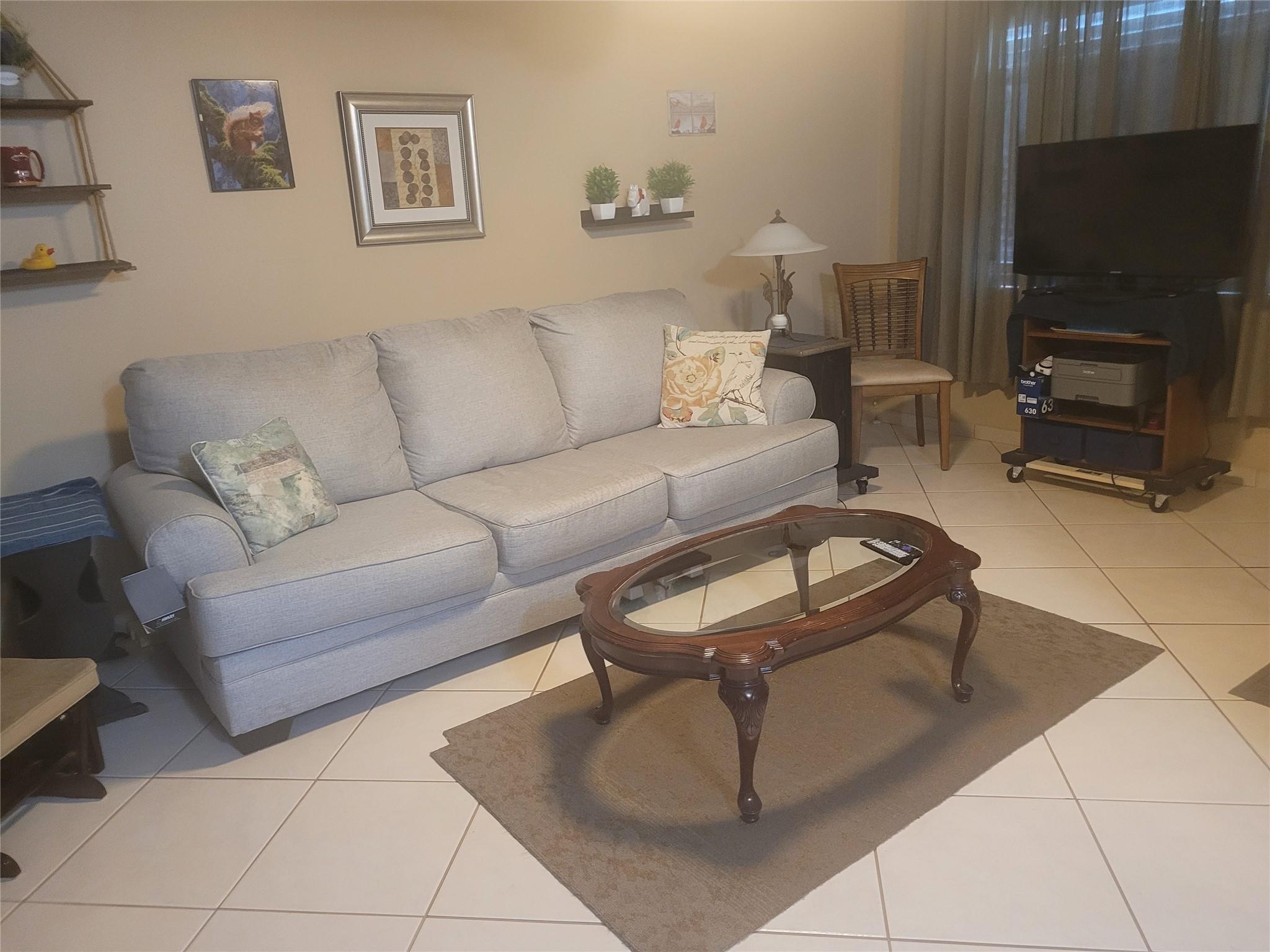 This beautifully spacious 1/1.5 condo is ready for you to move in and call your own. With generous sized rooms and ample closet space you'll immediately feel at home. The included MurphyBed and lovely powder room will make your overnight guests feel welcome. Unwind on your screened-in balcony. You'll have a roomy walk-in closet in your bedroom and in addition, an enormous utility closet & expansive hall closet. Enjoy cooking in your stylish galley kitchen. Get to know your friendly adult neighbors in this 55+ community. Relax by the pool with handy BBQ & tables. The onsite laundry & additional storage room complete the package! You'll have no worries: the electrical panel was installed in 2021, the A/C in 2020, and water heater in 2023. Great location, close to restaurants, beach and more.