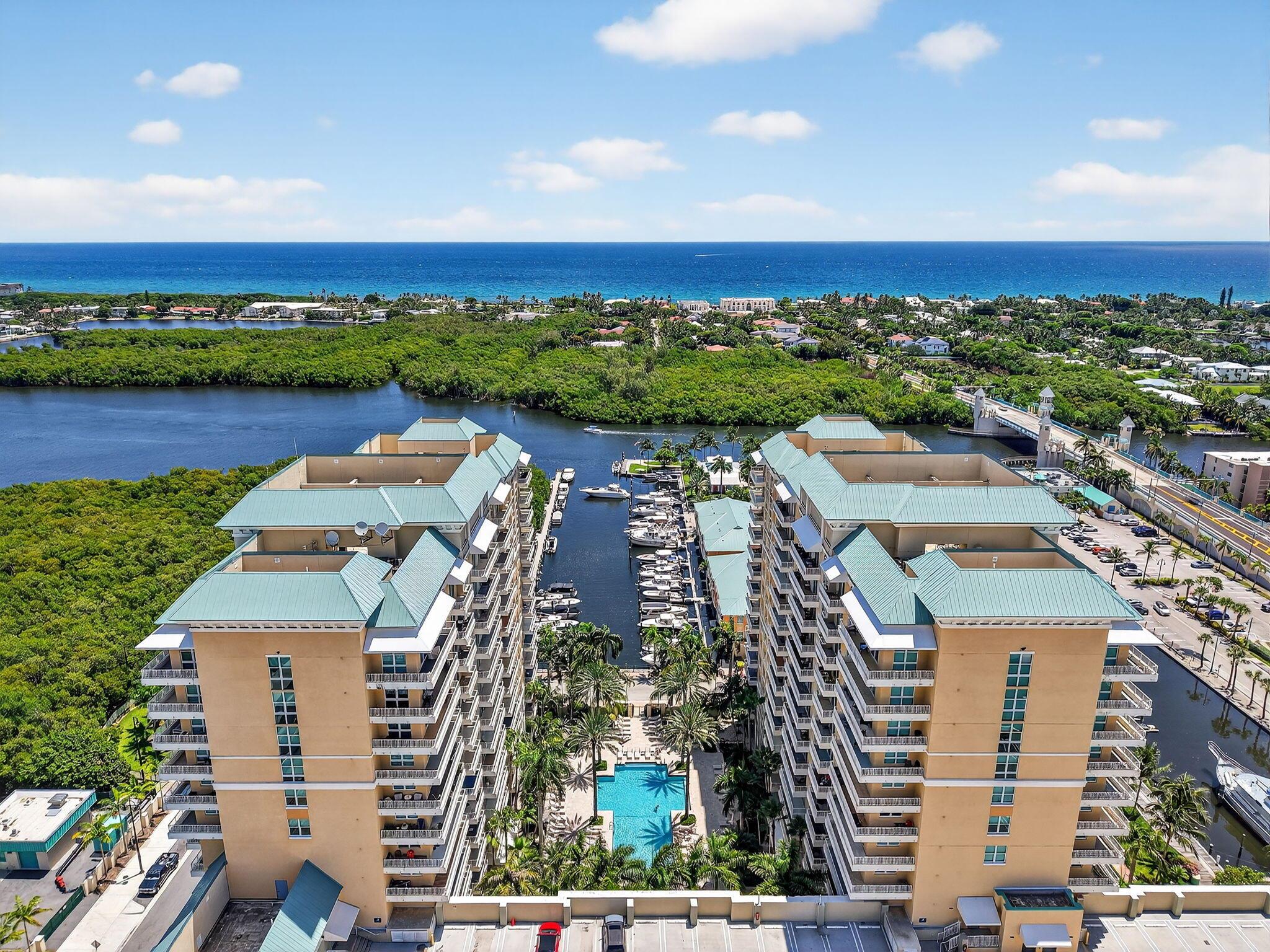 Killer investment, vacation retreat, or full-time coastal escape! Marina Village in Boynton Beach offers unbeatable rental flexibility--lease up to 12 times per year (30-day minimum), so you can enjoy it when you want and rent it when you're away. This 2-bedroom, 2-bath condo comes with the rare bonus of two parking spaces and boasts a prime southern exposure for sunshine and breezes, plus gorgeous marina views from your private balcony.Inside, you'll find two spacious master suites with a split floor plan, upgraded 24x48 porcelain tile flooring, and all impact windows. The kitchen features all newer appliances, and the 2024 A/C means worry-free comfort for years to come.