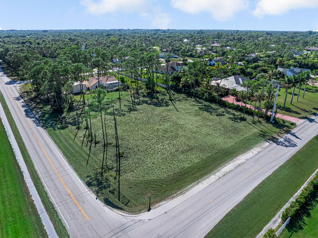 Photo of 12548 Temple Boulevard, The Acreage, FL 33412 (MLS # R11154420)