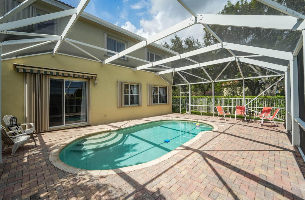 Photo of 672 GAZETTA Way, West Palm Beach, FL 33413 (MLS # B26085668)