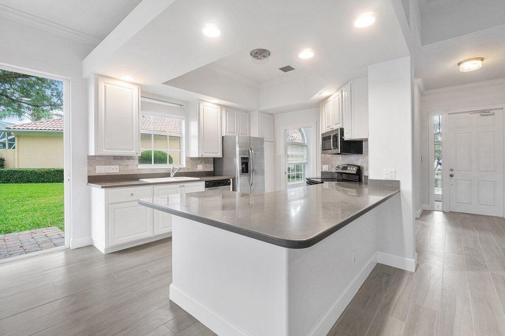 Photo of 8304 Pine Cay Road, Wellington, FL 33414 (MLS # R10936896)