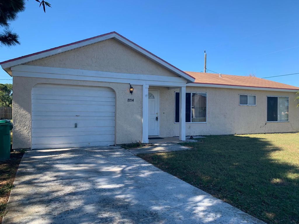 Photo of 2214 SE Sesame Lane, Port Saint Lucie, FL 34952 (MLS # R10768922)