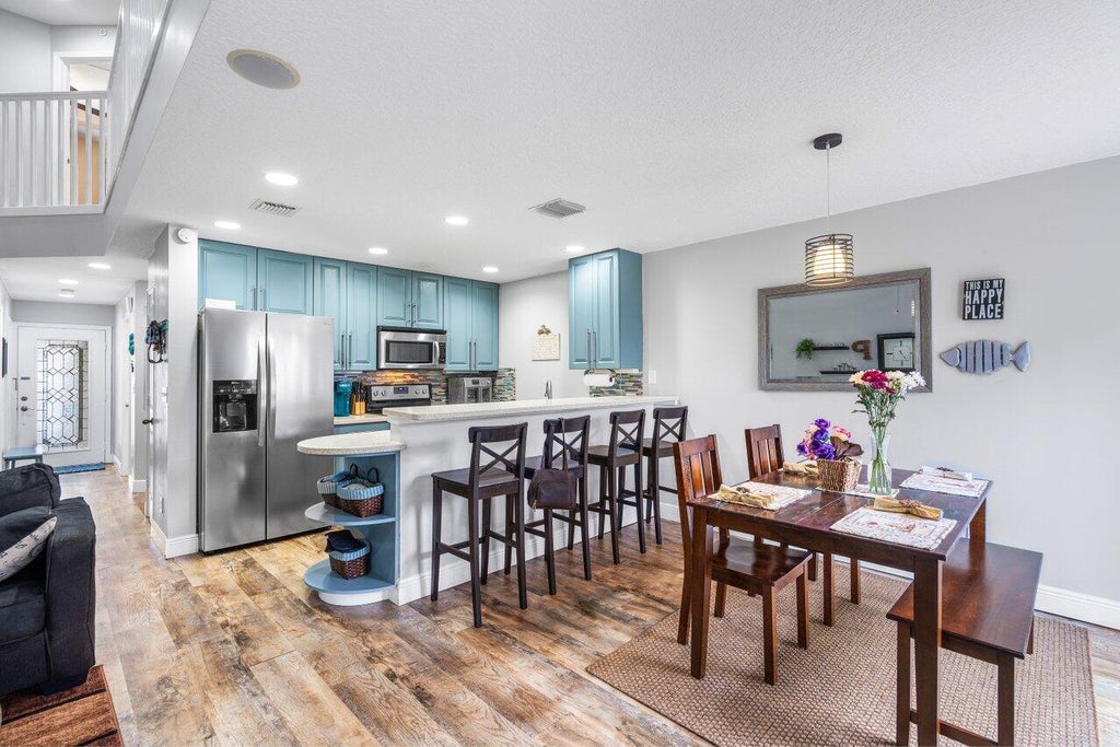 Photo of 12844 Woodmill Drive, Palm Beach Gardens, FL 33418 (MLS # R11056177)