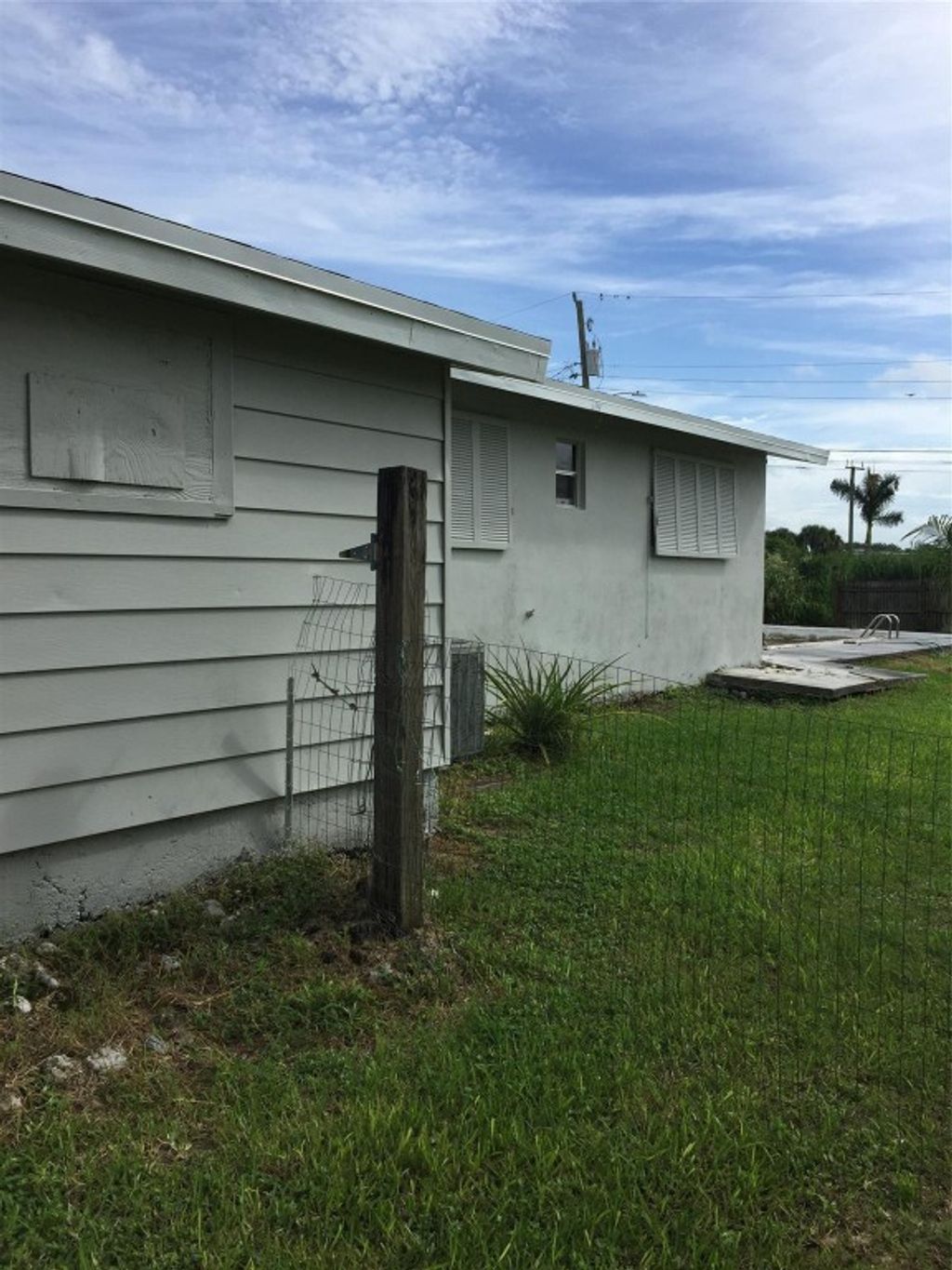 Photo of 140 N Greenstar Avenue, Pahokee, FL 33476 (MLS # F10465689)