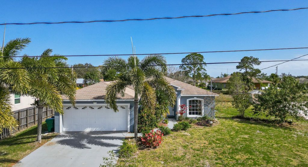 Photo of 3973 SW Wycoff Street, Port Saint Lucie, FL 34953 (MLS # F10411838)
