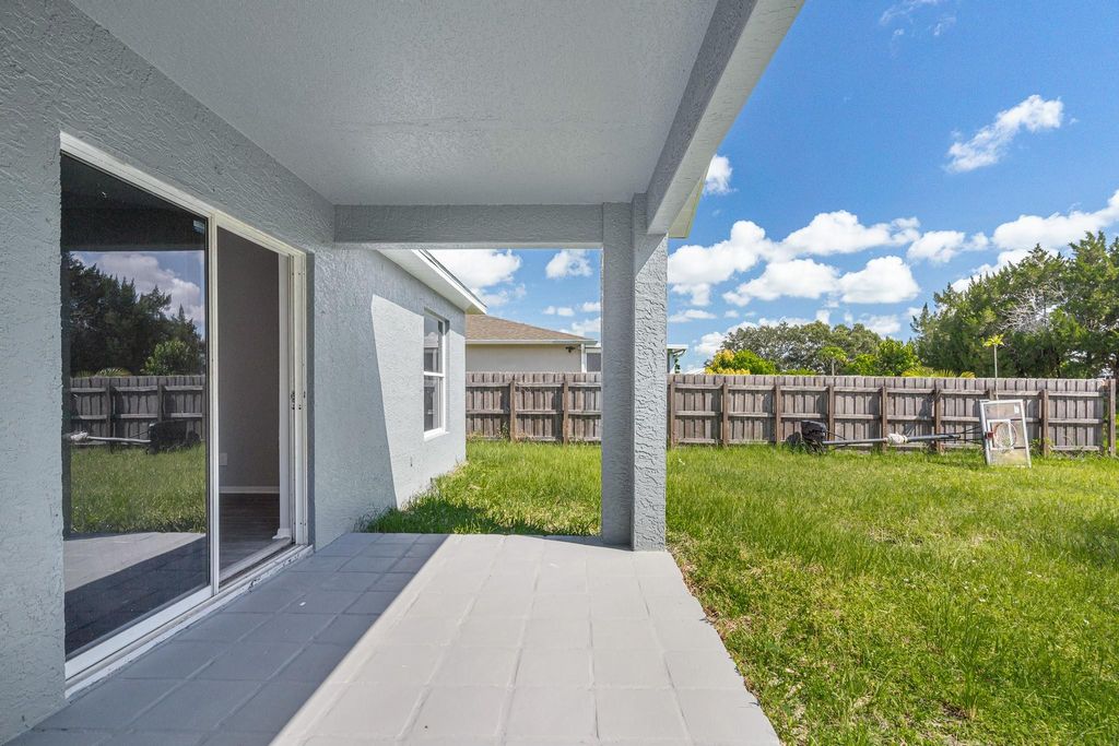Photo of 3973 SW Wycoff Street, Port Saint Lucie, FL 34953 (MLS # F10411838)