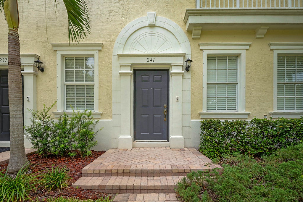 Photo of 241 E Thatch Palm Circle, Jupiter, FL 33458 (MLS # B26043743)