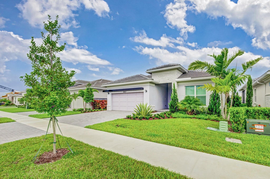 Photo of 10025 Driftwood Way, Palm Beach Gardens, FL 33412 (MLS # R11024325)