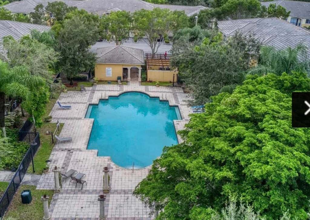 Photo of 1200 Crestwood Court S #1206, Royal Palm Beach, FL 33411 (MLS # B26055440)
