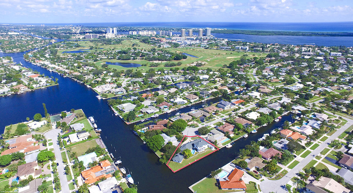 Old Florida meets new.Nestled in the heart of North Palm Beach's exclusive Country Club neighborhood this home offers a unique blend of old and new Florida. Four walls were repurposed during a 2015 essentially new build that added a second story. Lifted from the pages of Architectural Digest, the fabulous master suite enjoys panoramic views of the waterfront, a large private balcony. and a spacious master bath. The grand, well-appointed kitchen opens to the living room. Renovations also include all new baths, electrical, HVAC and hurricane windows and doors.Located at the end of a cul-de-sac with Southeast exposure, this property is a boaters dream home with over 250' of L-shaped waterfront including 210' of deep water canal protected dockage. A perfectly positioned pool, a