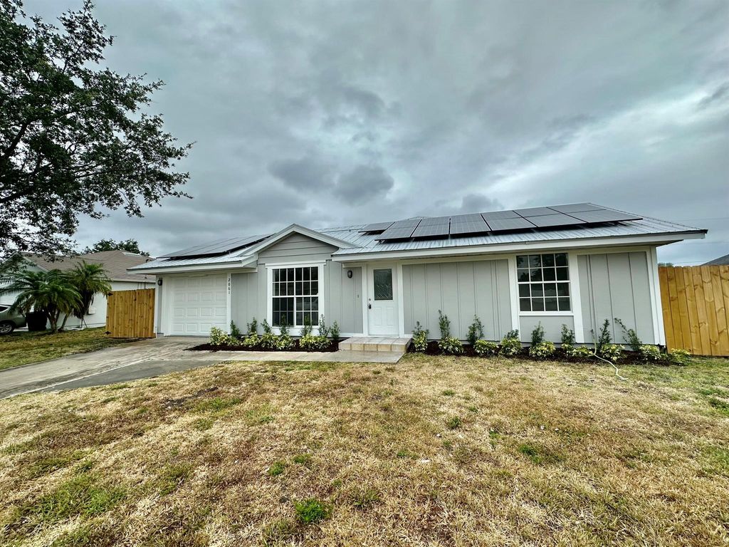 Photo of 2061 SW Burman Lane, Port St Lucie, FL 34984 (MLS # R10980853)