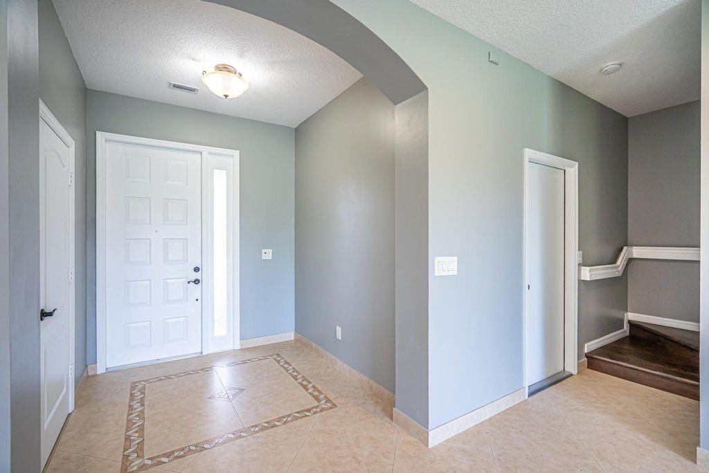 Photo of 460 Rainbow Springs Terrace, Royal Palm Beach, FL 33411 (MLS # B26026579)