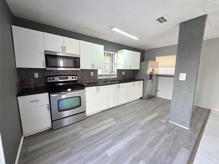 This beautifully renovated two-story home offers 3 spacious bedrooms and 2 full bathrooms upstairs, along with a convenient half bath on the main floor. The master bedroom features a private deck with lovely views of the yard and surrounding community. Enjoy a large backyard perfect for family gatherings and outdoor activities. Recent upgrades include fresh paint throughout and brand-new carpeting on the second floor. Located in a family-friendly neighborhood close to major highways and shopping centers, this move-in-ready home is ideal for creating lasting memories with your loved ones.