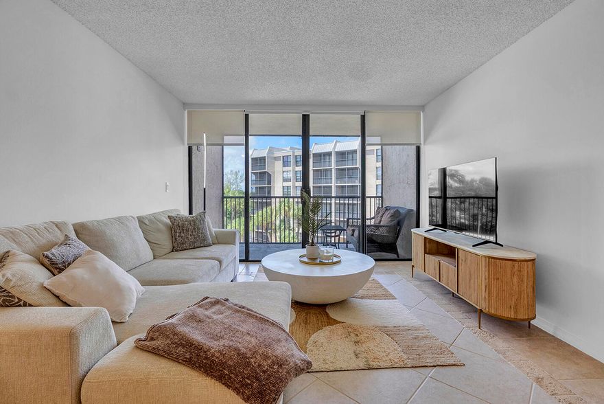 Beautiful 2BR/2BA waterfront condo in sought-after East Boca! Bright, spacious, with water views from every room. Features stainless steel appliances, newer AC, in-unit BOSH Washer/Dryer, and a screened balcony perfect for morning coffee or evening chats. Located in a 24-hr man-gated community with lagoon, docks (upon availability), 5 pools, gym, sauna, clubhouse, bocce & shuffleboard. Walk to shops, restaurants, Intracoastal and the beach. Great Location! Investors welcome can rent right away! All assessments are Done and Completed! Connecting Hearts & Properties!