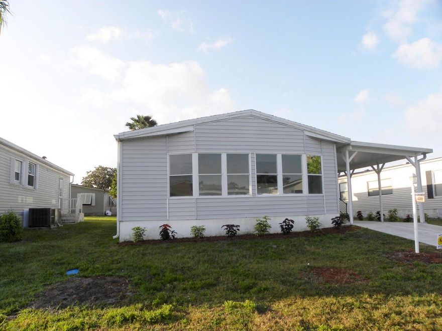 Beautifully remodeled home, 2 bed, 2 bath new flooring throughout, updated kitchen, bathrooms, lighting, ceiling fans, roof and A/C is approximately 3 years old, Stainless Steel appliances, don't miss this move in ready home with affordable lot rent.  Buyer to verify all information.