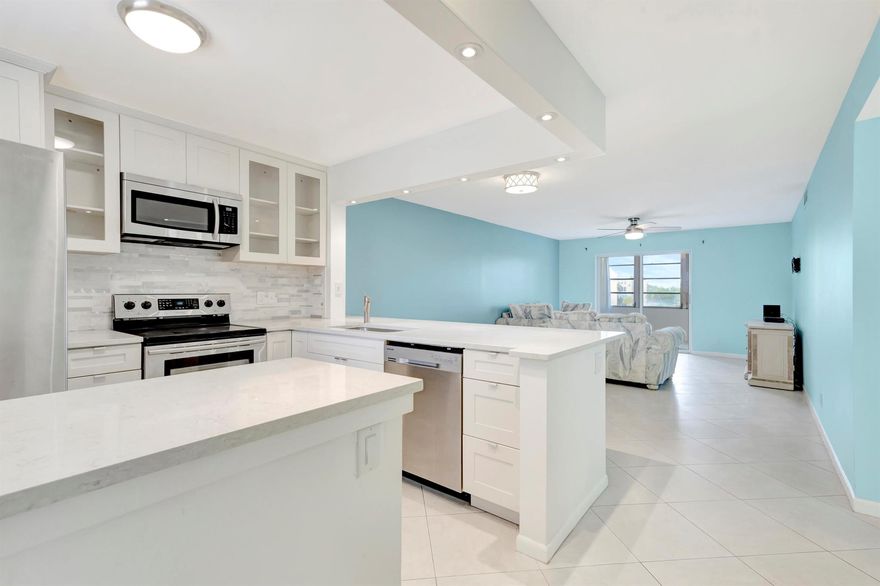 2/2 condo located in East Boynton Beach. Totally remodeled kitchen featuring quartz counter tops, white shaker cabinets, custom backsplash, and Samsung stainless-steel appliances. The kitchen is open to the family room perfect for entertaining guests. AC and water heater new in 2018. Village Royale on the Green is an active community with great amenities, play tennis, pickleball, bocce ball or just relax by the pool. Just a short drive to down town Delray Beach, West Palm and the beaches! This Building has a fully funded Reserve and No required upcoming assessments, The Condo Fee Includes, Insurance on Building, Wi-Fi, Cable, & Water, All resort Style Amenities, 2 Pools, 2 Club Houses, Theatre, new Fitness Room, Putting Green, Bocci & Tennis Courts And More..