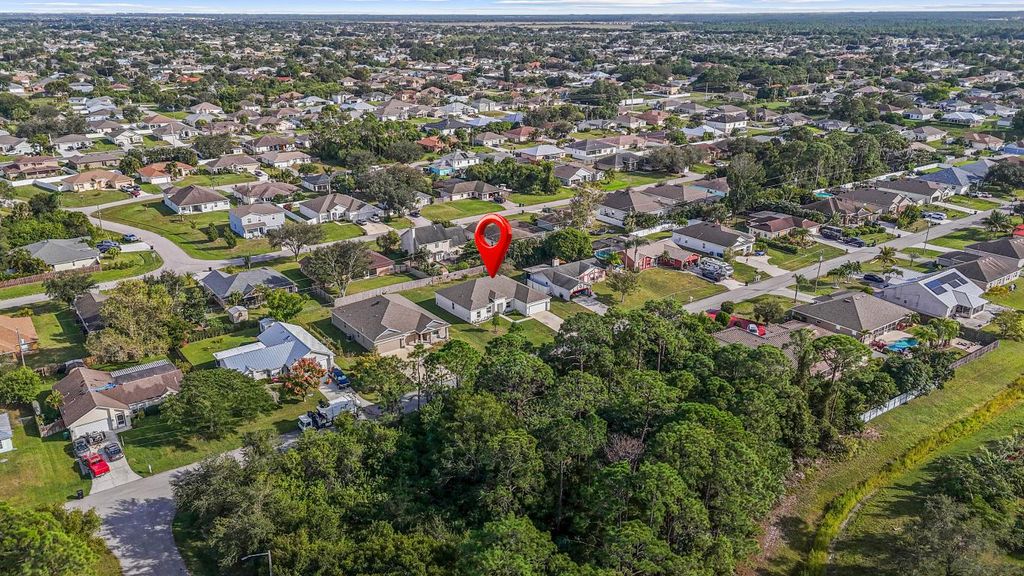 Photo of 4241 SW Tuscol Street, Port Saint Lucie, FL 34953 (MLS # R11140831)