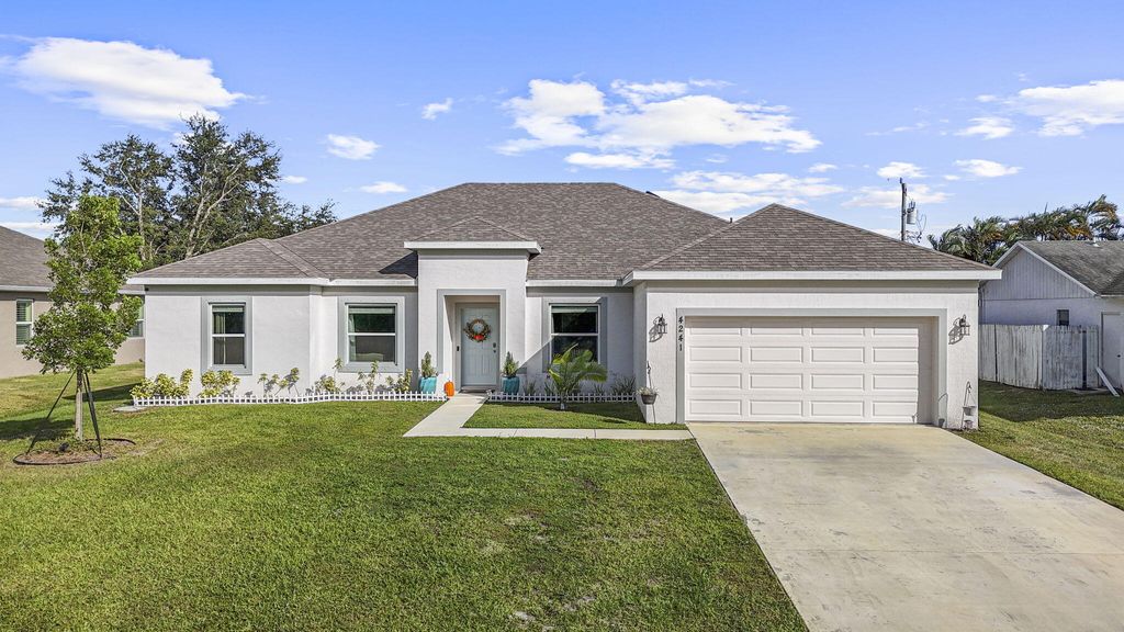 Photo of 4241 SW Tuscol Street, Port Saint Lucie, FL 34953 (MLS # R11140831)